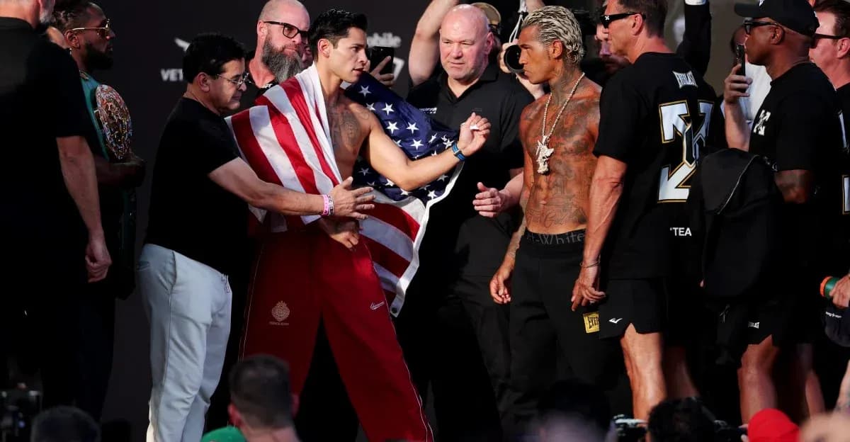 Two boxers facing off at weigh-in event