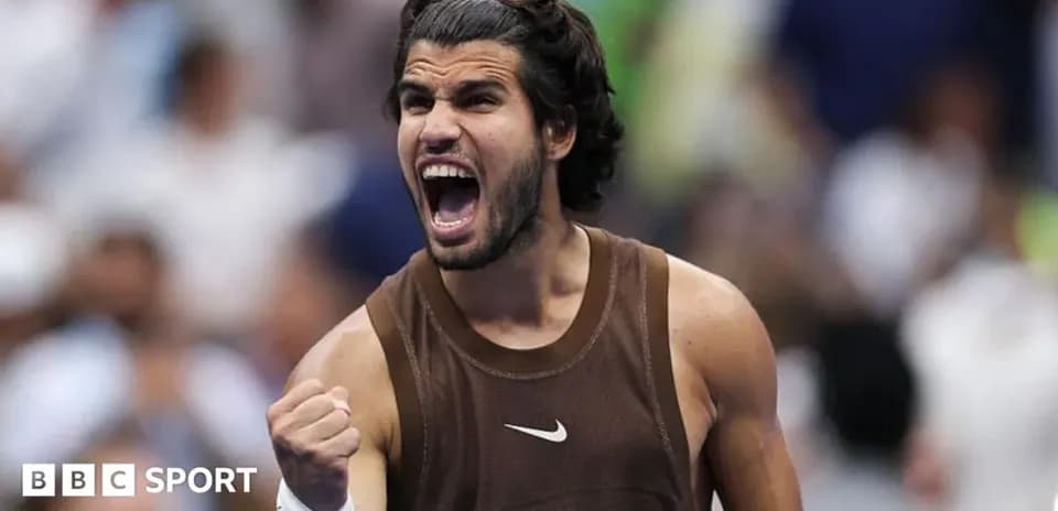Tennis player celebrating victory with clenched fist