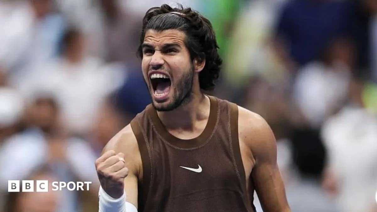 Tennis player celebrating victory with clenched fist
