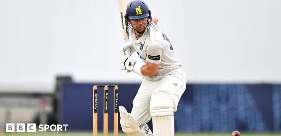 Batsman preparing to hit a ball in cricket match