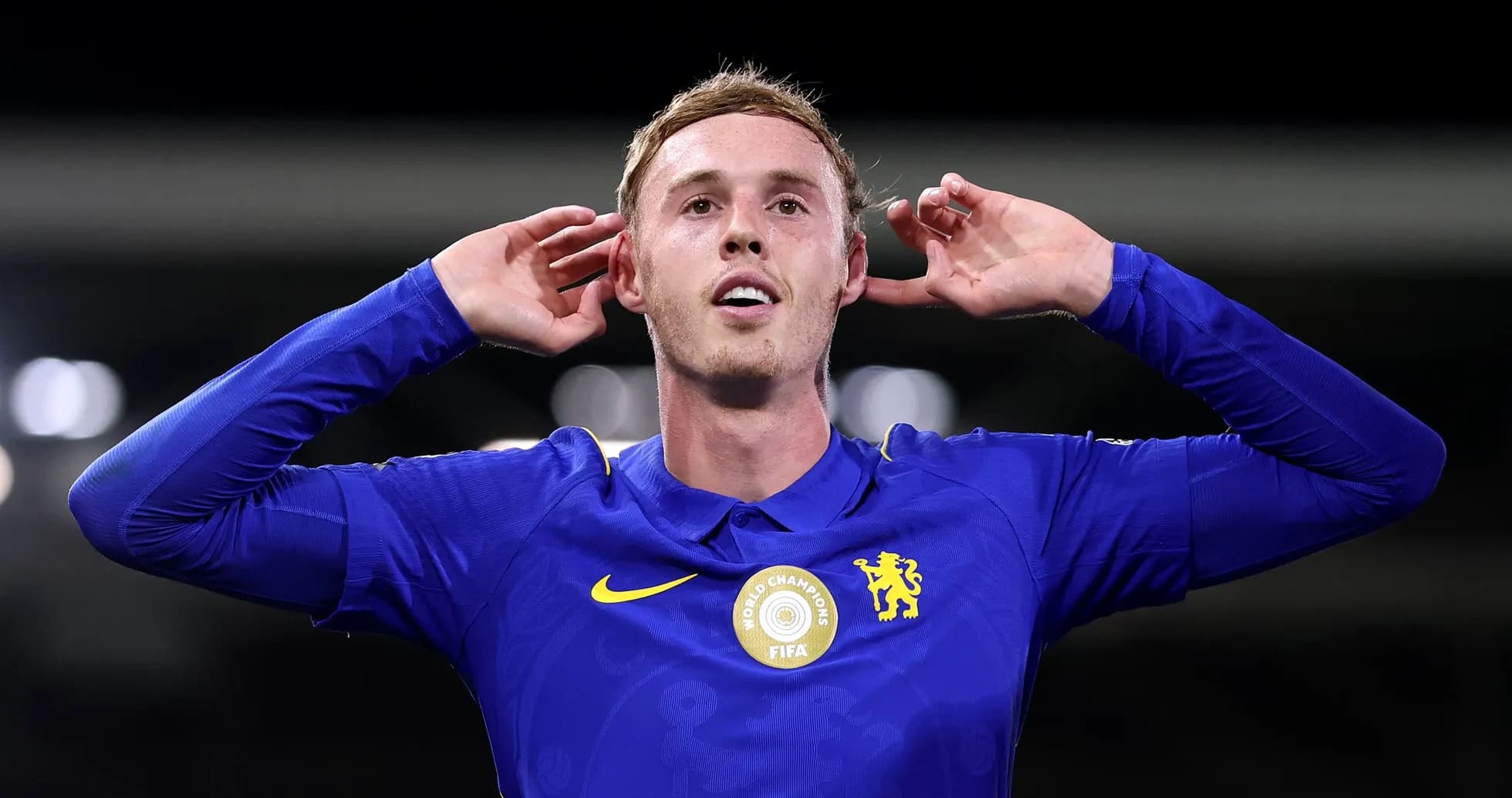 Player celebrating in Chelsea jersey during match