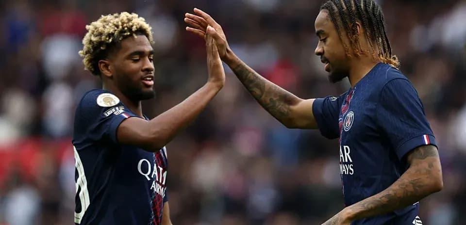 Two Paris Saint-Germain players celebrating a moment