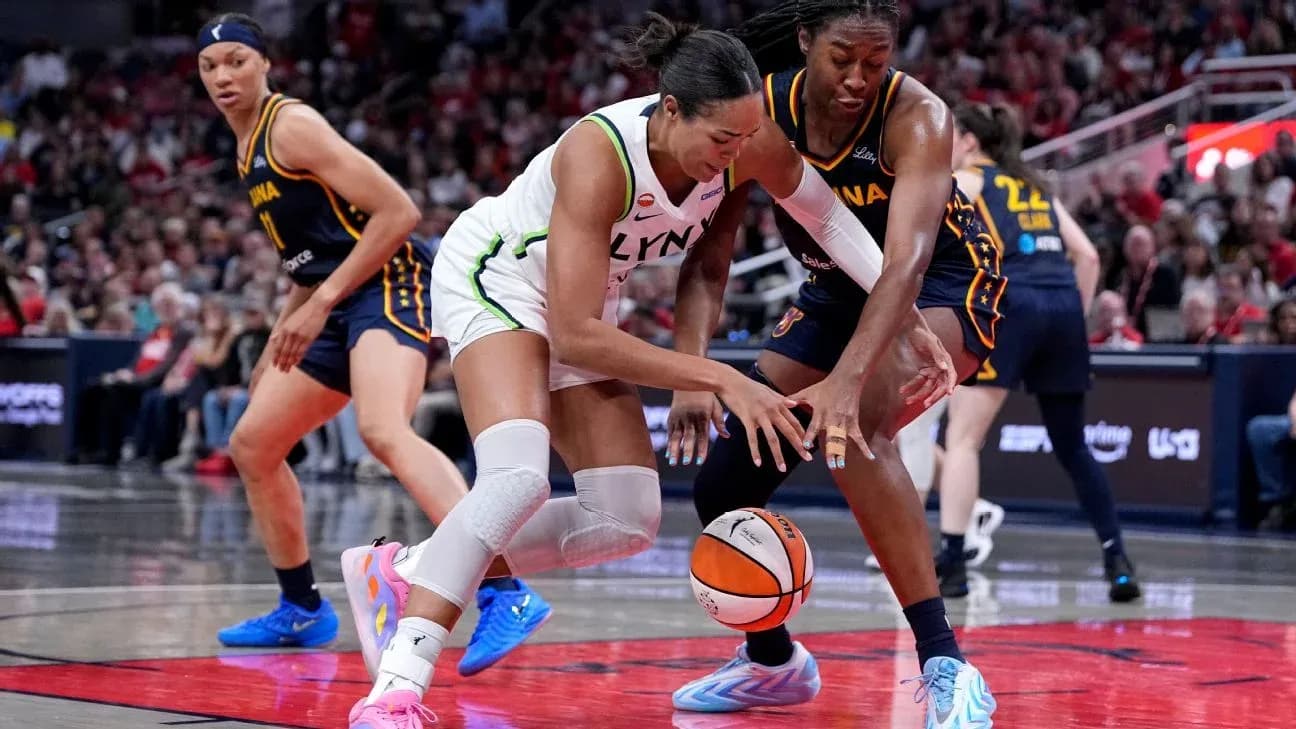 Players battling for the basketball on the court
