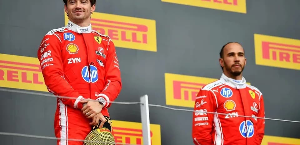 Two drivers on podium after a race