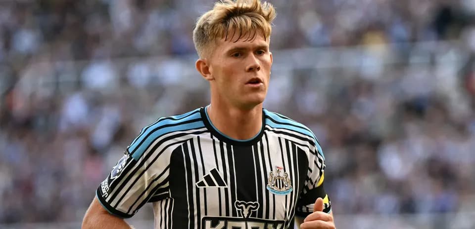 Newcastle United player running during a match