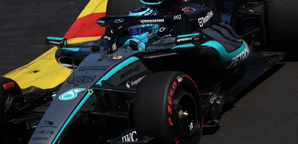 Mercedes F1 car racing on track during event