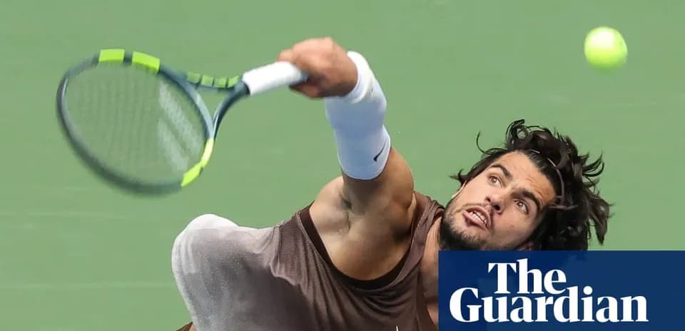 Player serving the ball during a tennis match
