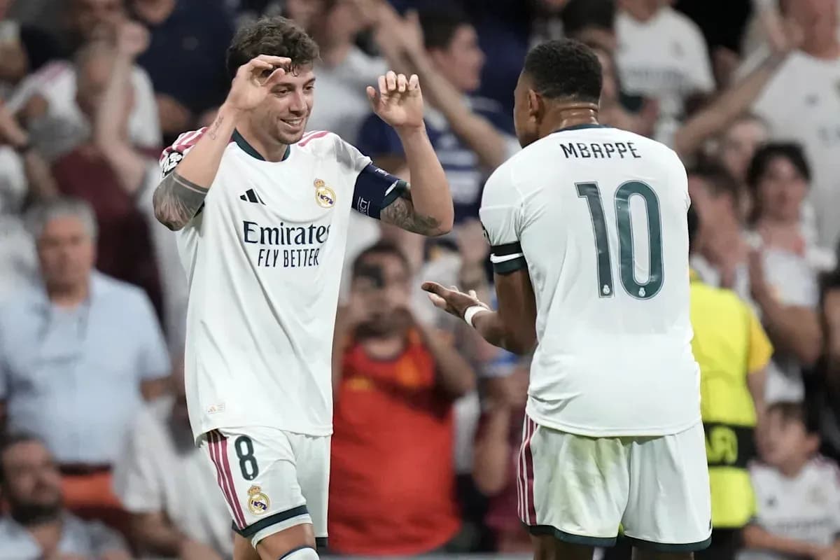 Real Madrid players celebrating a goal together