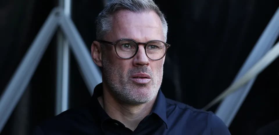 Man in glasses looking intently off-camera
