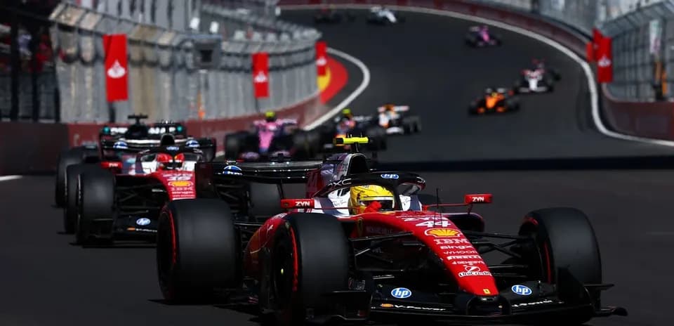 Ferrari car leading in Formula 1 race on track