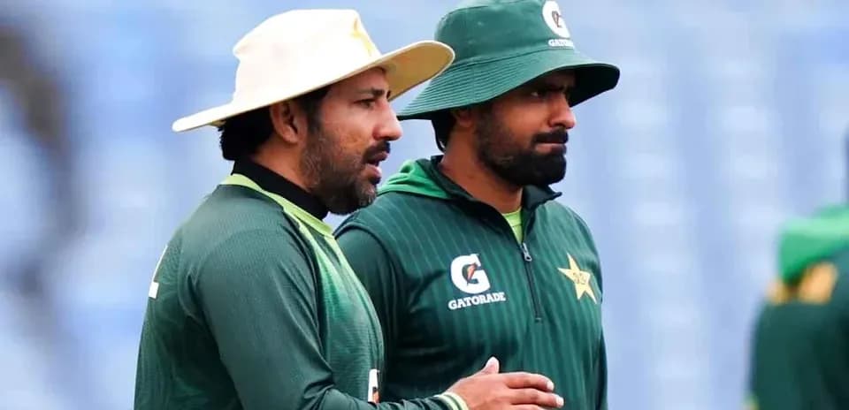 Two cricket players discussing during training session