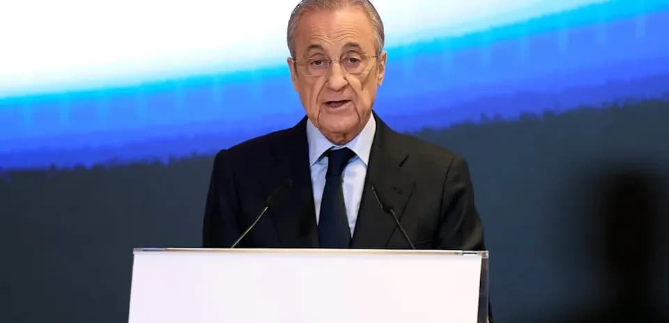 Person speaking at podium with microphones