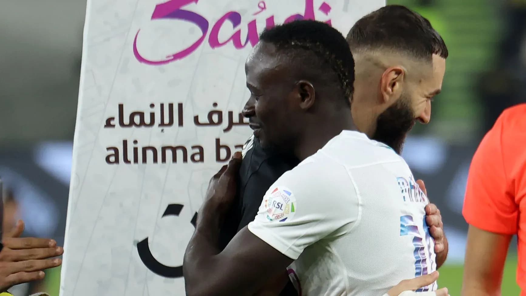 Players embracing after a match celebration