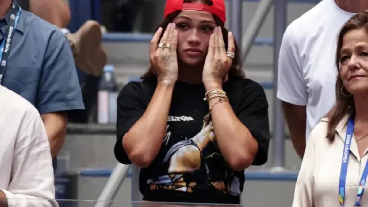 Spectators reacting during a tense moment at event