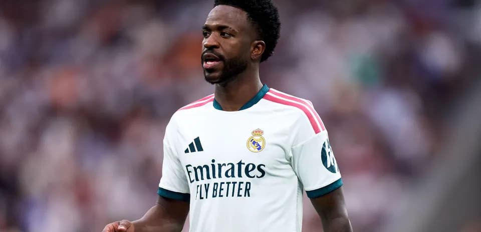 Player in Real Madrid kit during match action