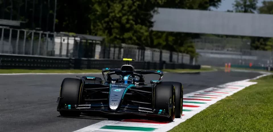 Formula 1 car navigating track at Monza