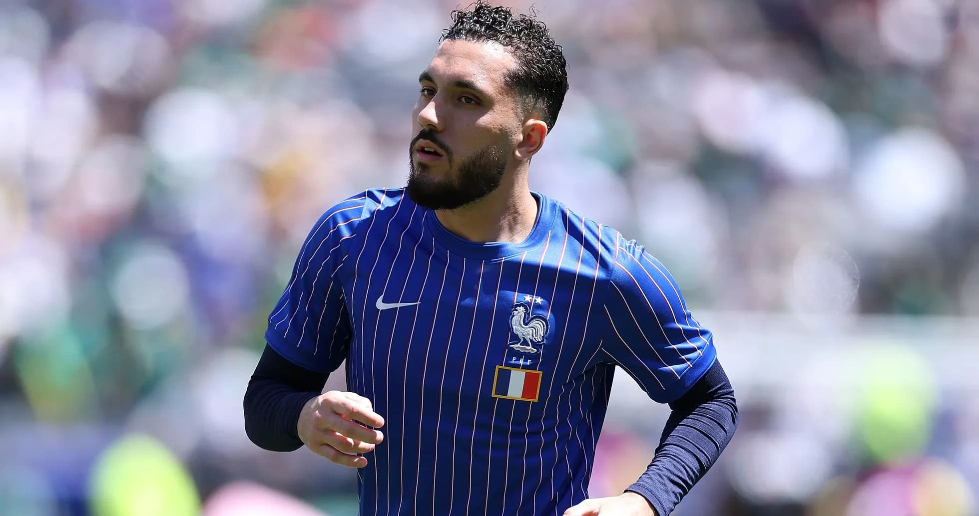 Player warming up in France national team kit
