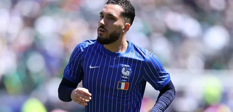 Player warming up in France national team kit