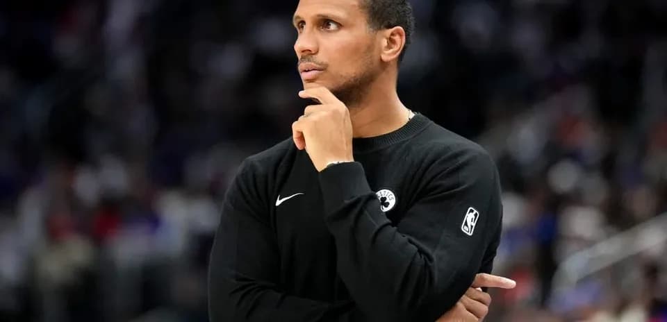 Coach observing game from the sidelines