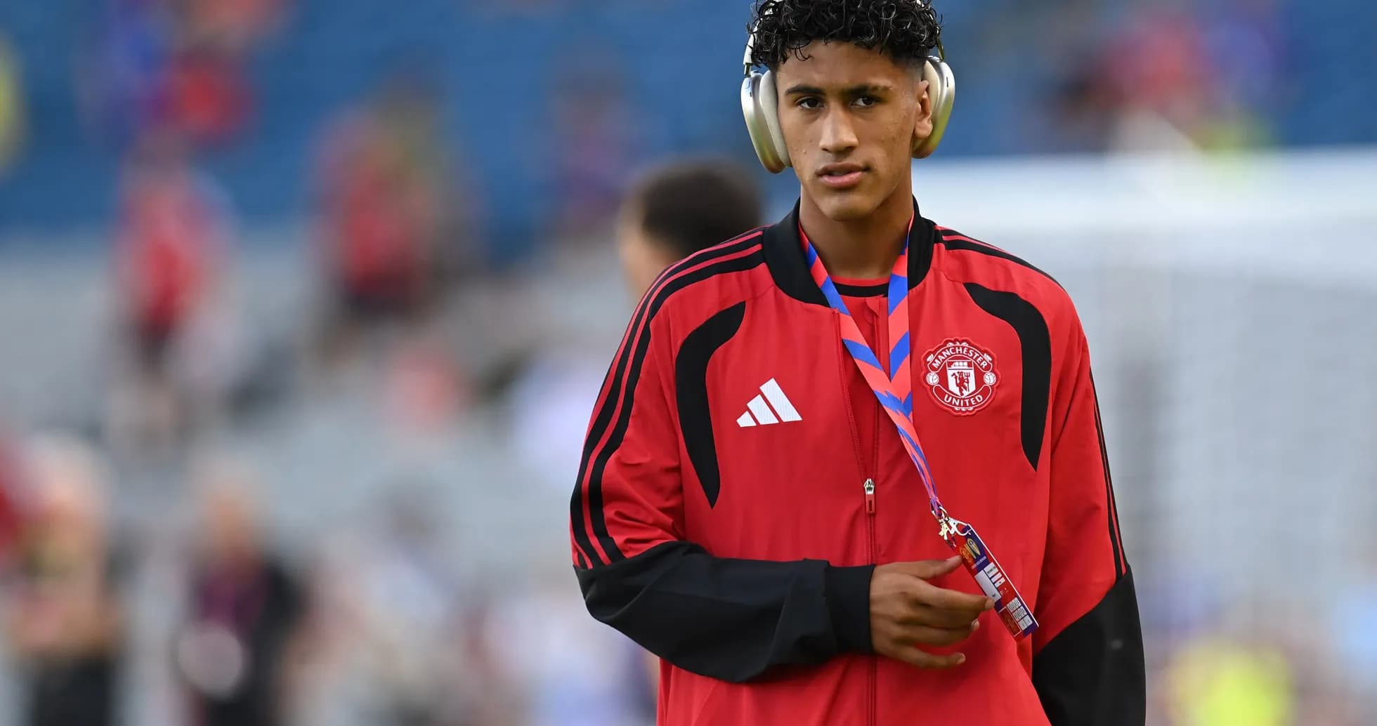 Player wearing headphones before the match