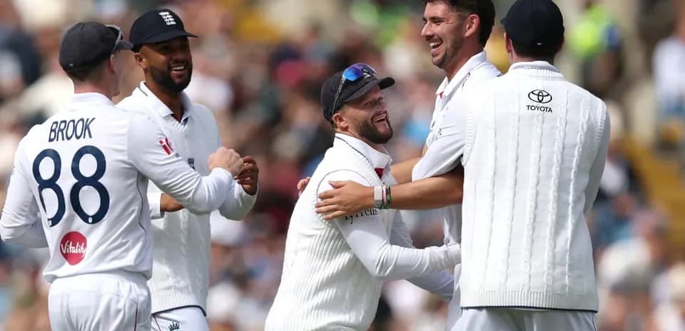 England cricket team celebrating a wicket on field