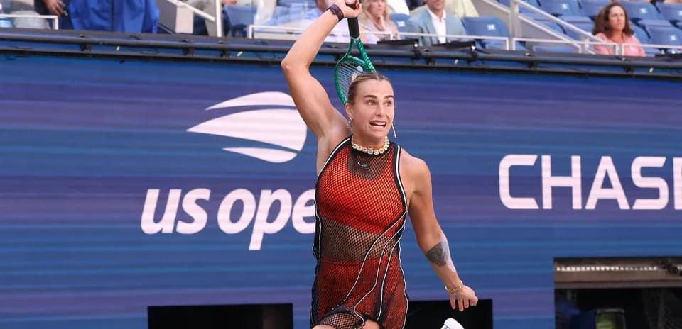 Player serving during US Open tennis match