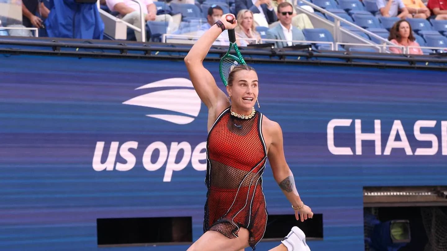 Player serving during US Open tennis match