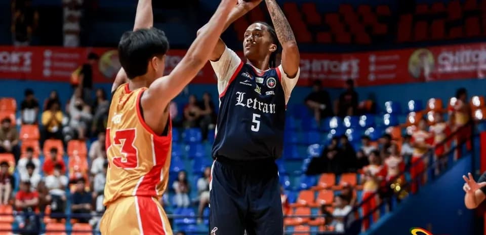 Player shooting a basketball during game action