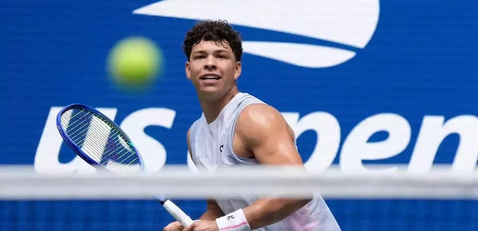 Player preparing to hit a tennis ball during match