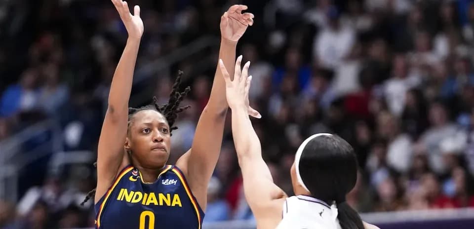 Player shooting during Indiana basketball game action