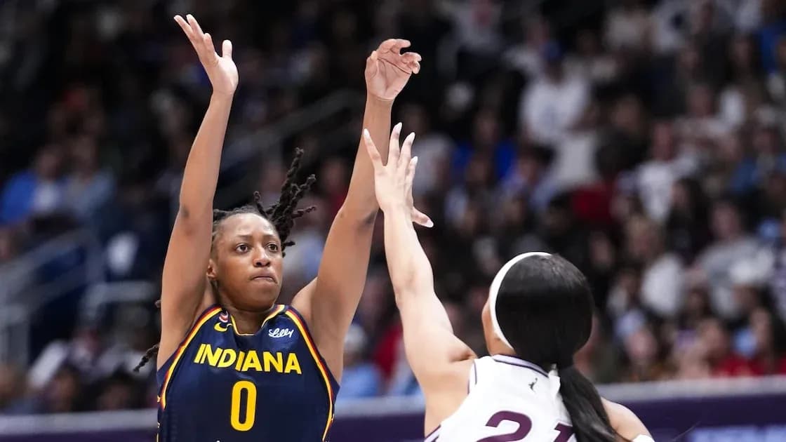Player shooting during Indiana basketball game action