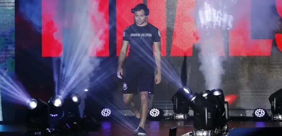 Athlete walking onto stage during finals event