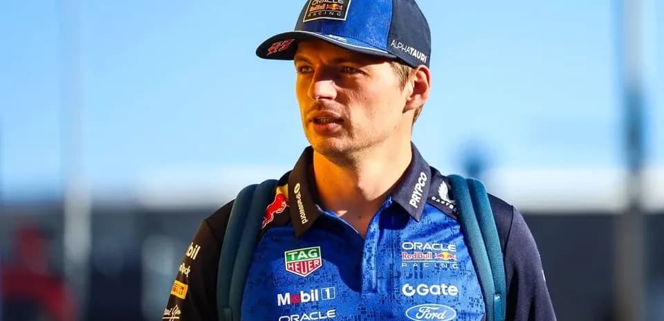 Driver in team uniform walking with backpack