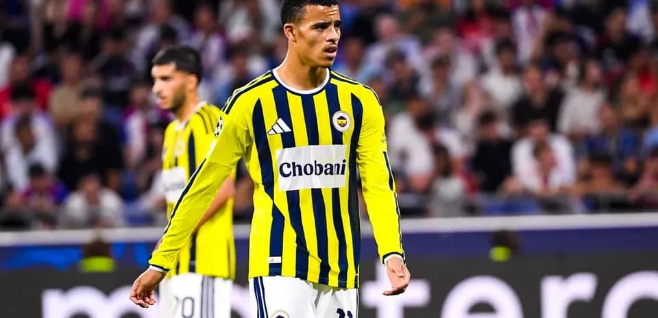 Fenerbahce player during match with yellow jersey