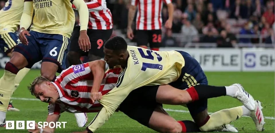 Players competing for the ball during a match