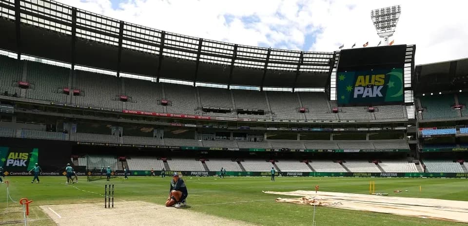 Cricket pitch preparation at stadium before match