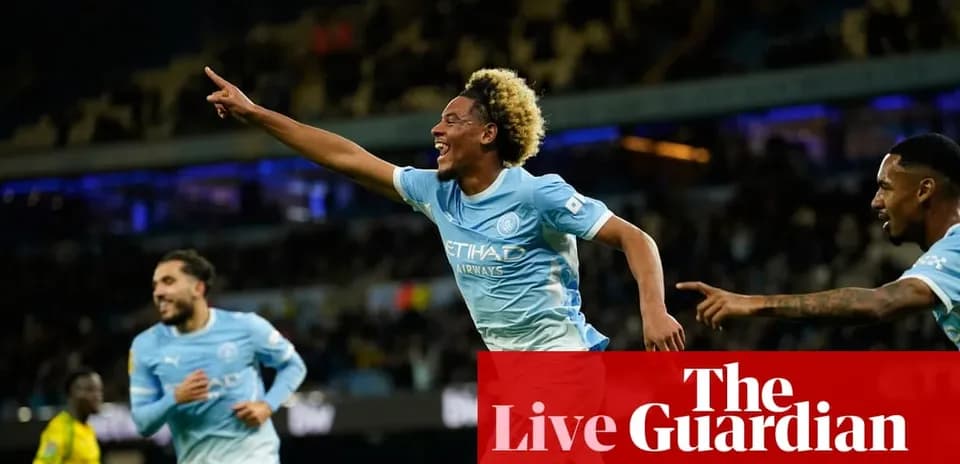 Player celebrating after scoring a goal for Manchester City