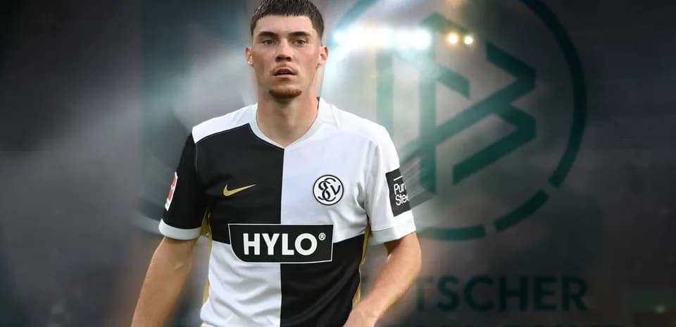 Player in team jersey with DFB logo in background