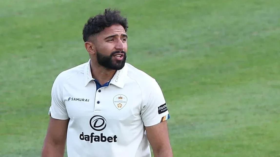 Cricketer wearing Derbyshire kit on field
