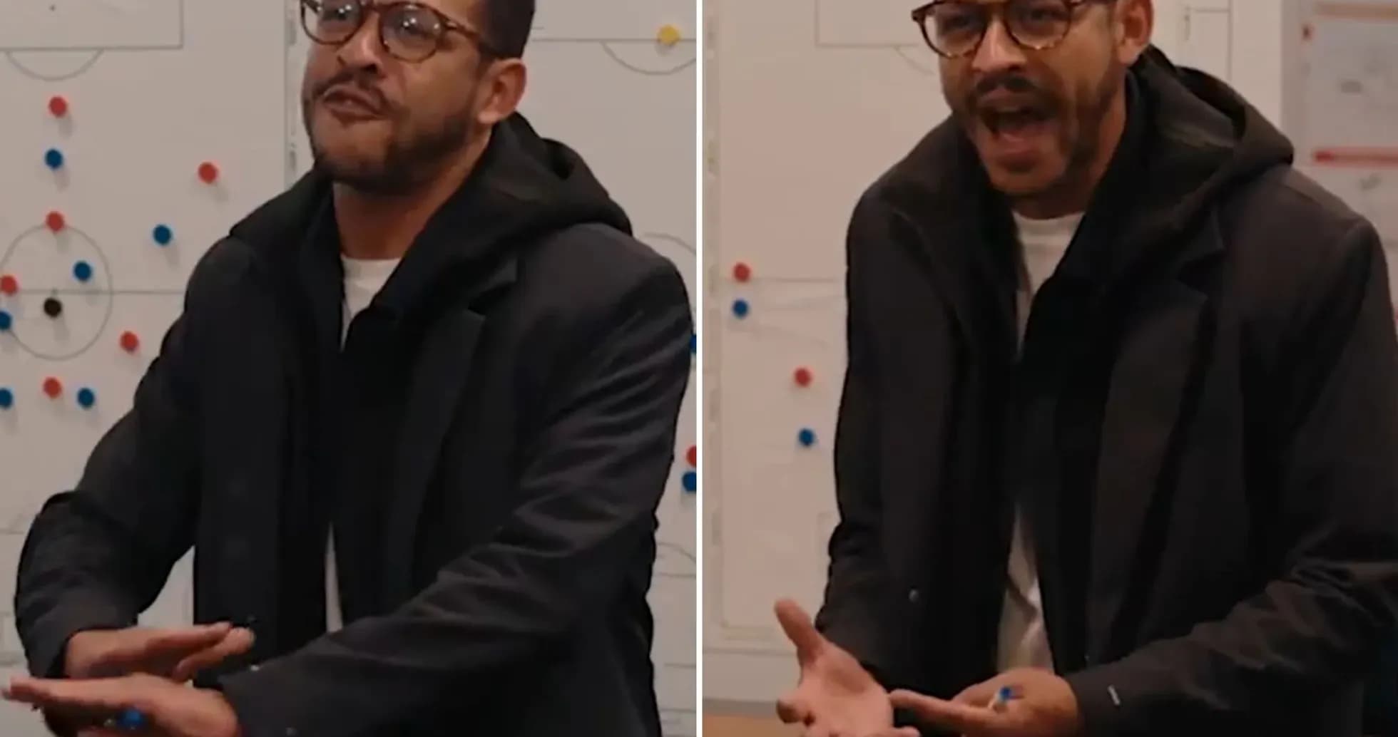 Coach discussing strategy in front of tactics board