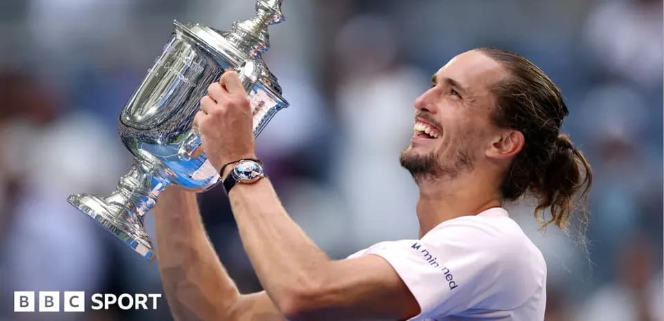 Player celebrating victory with trophy at event