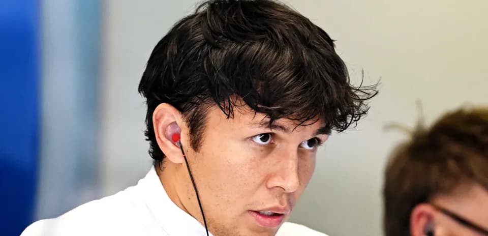 Driver listening intently during a team meeting
