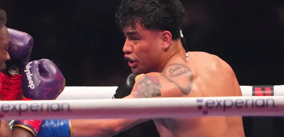 Boxer throwing a punch during a match