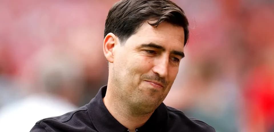 Coach on the sidelines during a match