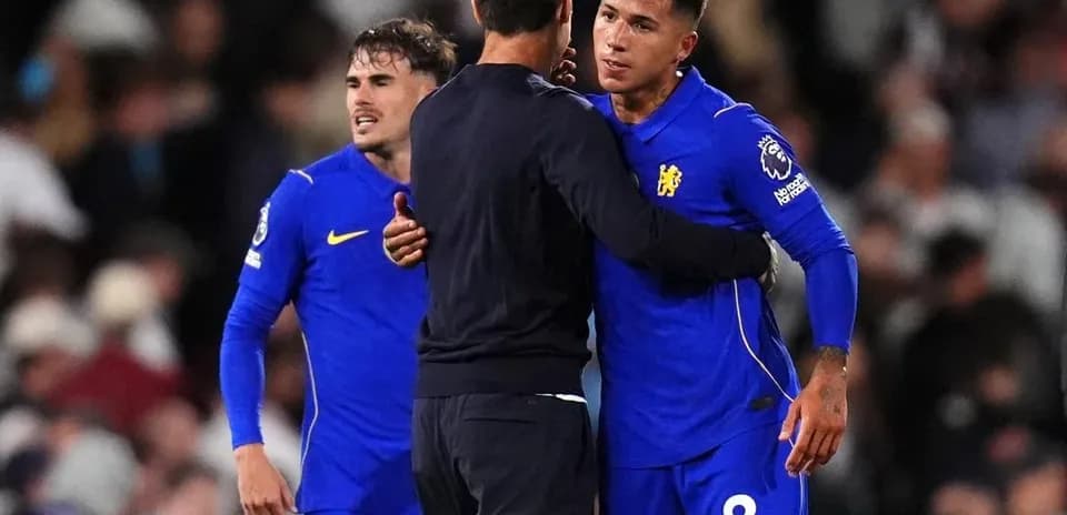 Chelsea players and coach in post-match embrace