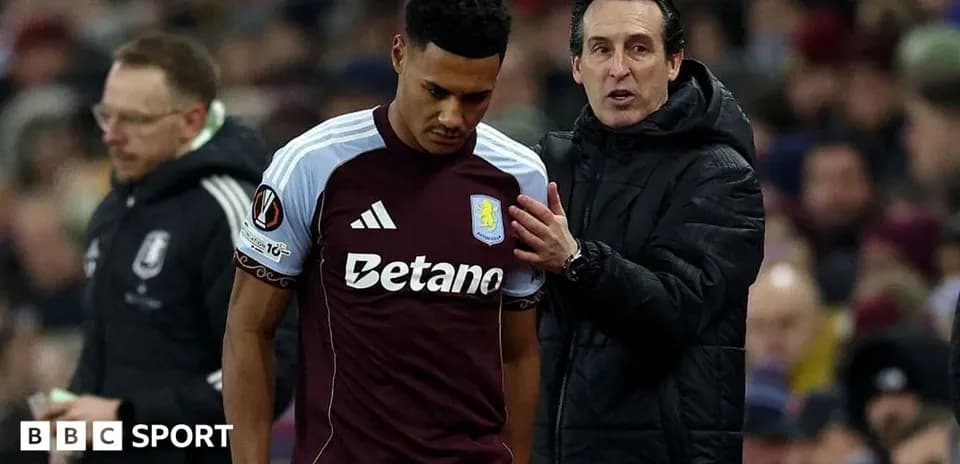 Coach discussing with player during match substitution