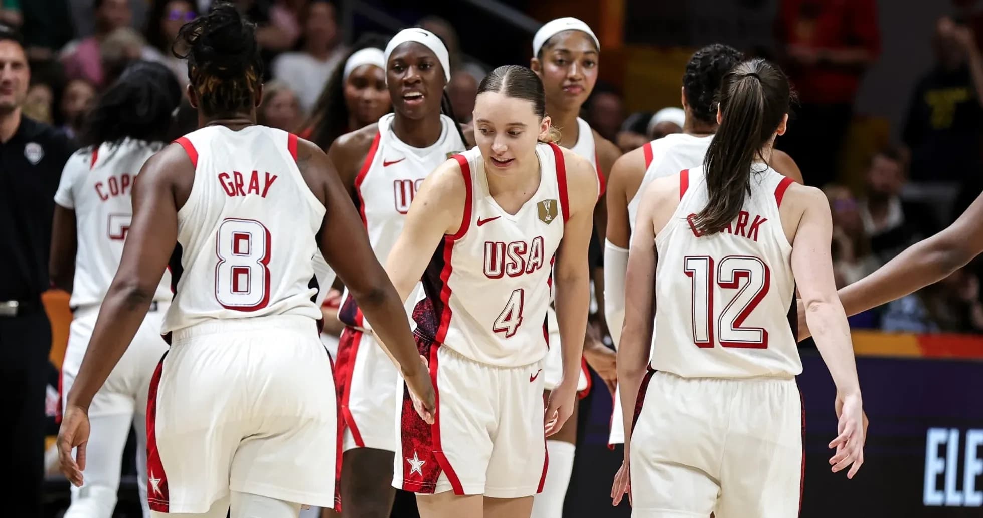 USA women's basketball team celebrating during a game