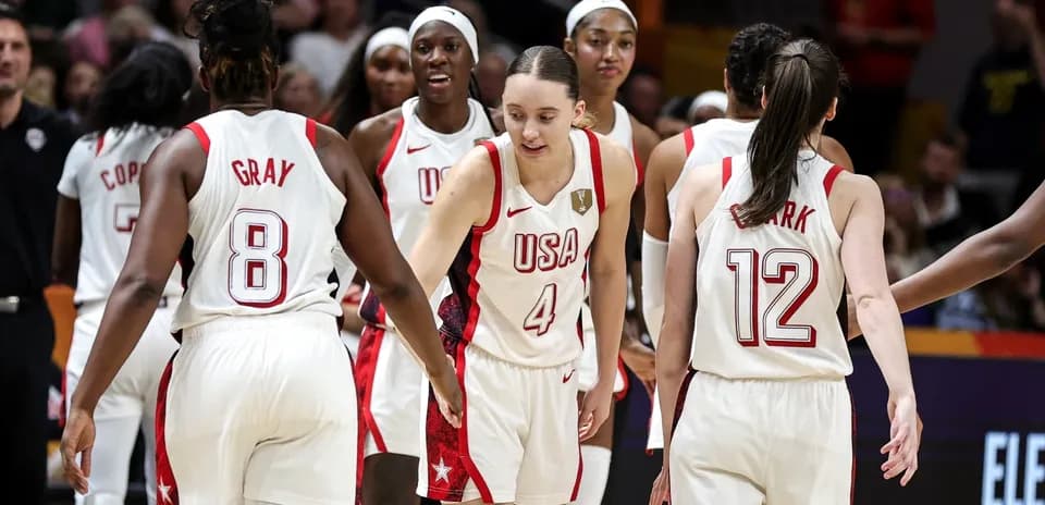 USA women's basketball team celebrating during a game