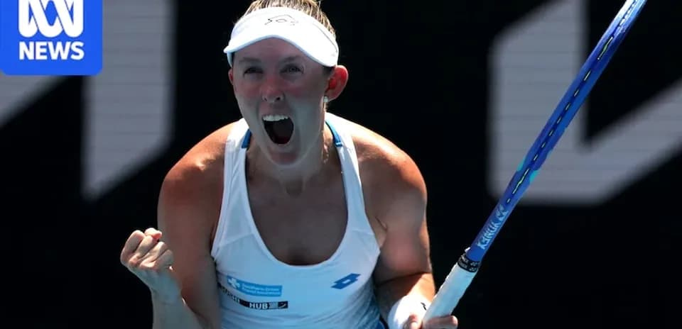 Tennis player celebrating after winning a point