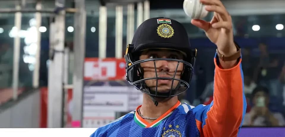 Cricketer holding a ball before match
